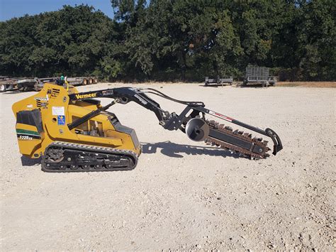 operating a mini skid steer